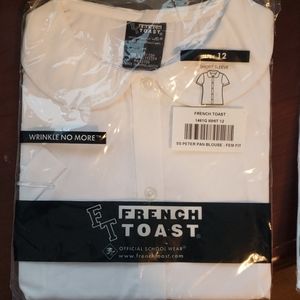 White blouse. Childs sizes. New. French toast